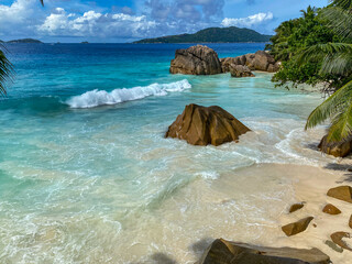 Beautiful seascapes of Seychelles islands with sun and turquoise waters