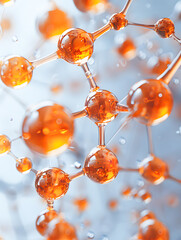 Close-up of orange molecular structure on a light background, representing scientific and technological advancements.
