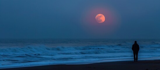 Solitary Figure Under the Blood Moon