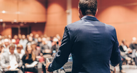 Speaker at Business Conference with Public Presentations. Audience at the conference hall....
