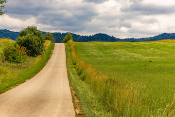 Bicycle route for a trip around Lake Czorsztyn, panorama of the Tatra Mountains