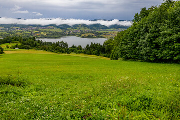 Fototapeta premium Bicycle route for a trip around Lake Czorsztyn, panorama of the Tatra Mountains
