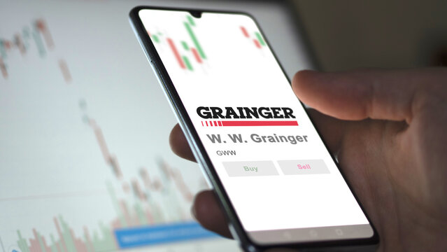 Grainger, Lake Forest, Illinois. Close up on logo of W. W. Grainger on the screen of an exchange. W  W  Grainger price stocks, $GWW on a device.