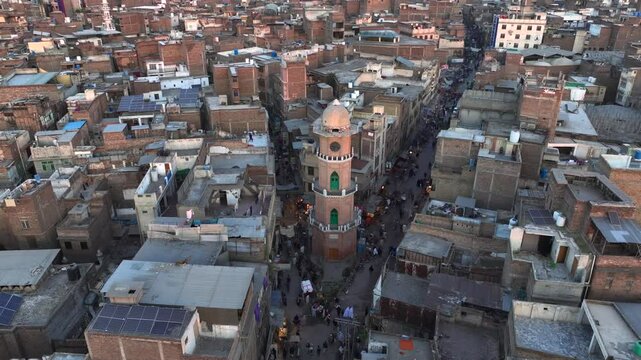 Cunningham Clock Tower on Streets of Peshawar, Pakistan. Downtown City Center Drone view Aerial Evening twilight Shot