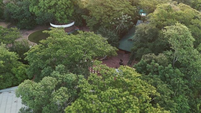 A parallax drone shot of the green environment with an amazing wedding decoration in the middle of the Paran&aacute; River in Posadas, Misiones.