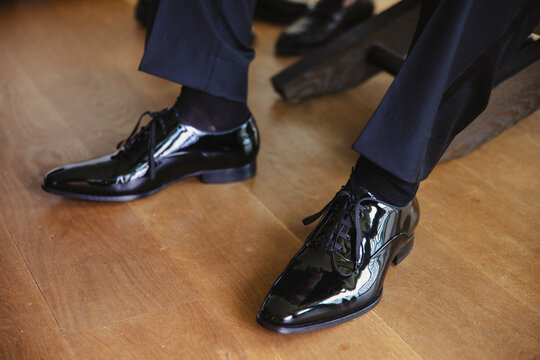 grooms black leather shoes