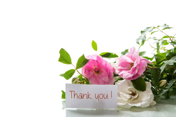 wooden light background with white and pink roses
