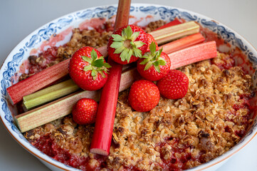 Fresh fruits on baked fruit pie with crumb dough