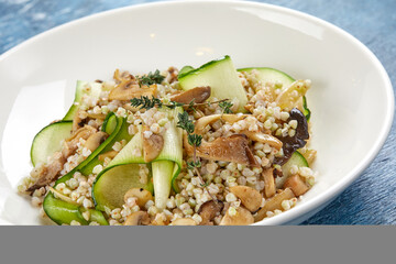 burley with fresh vegetables on white plate