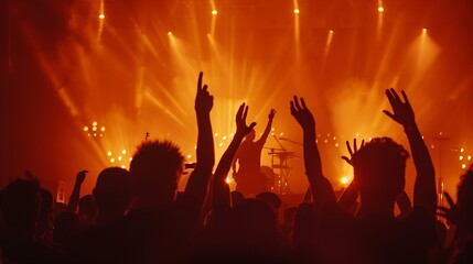 Silhouettes of people rising their hands and having fun at the music open air festival Nightlife People dancing at rock concert and going wild There are orange stage lights On stage ar : Generative AI