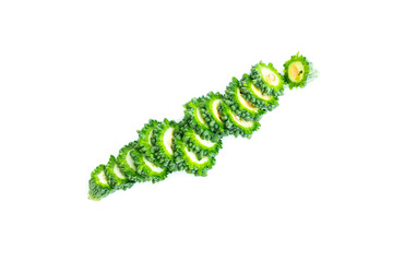 Bitter gourd fruit sliced isolated on white background, Organic vegetable, Herbal plant, Food ingredient	