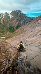 Obraz premium A man embarks on a challenging hike to Pico Aguerri, immersed in the natural splendor of the Western Valleys, near the Gabardito Refuge and the Selva de Oza.
