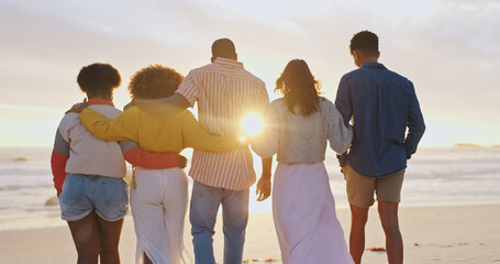 Ocean, back and friends hug at sunset on vacation, holiday and travel on tropical island. Embrace,...