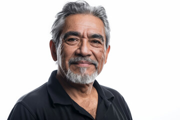 Obraz premium Gorgeous elderly Hispanic man with a confident expression, facing the camera, isolated on white background.