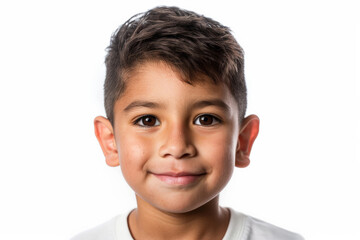 Sweet Hispanic preschool-aged boy with a confident expression, facing the camera, isolated on white background.