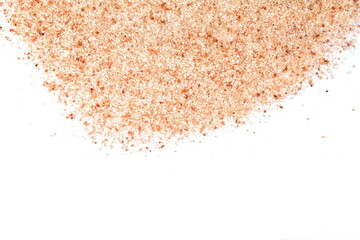 Himalayan salt grains isolated on white background
