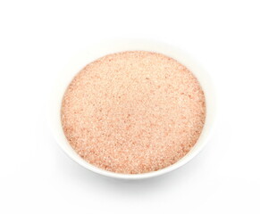 Pink Himalayan fine salt in white bowl isolated on white background. Top view.