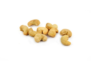 Unshelled roasted cashew nuts isolated on white background
