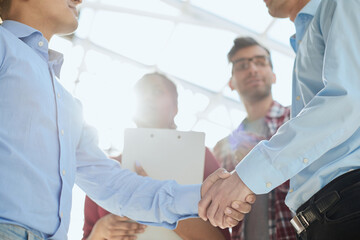 Obraz premium Portrait of a businessman and business woman discussing and cheering with agreement for success.