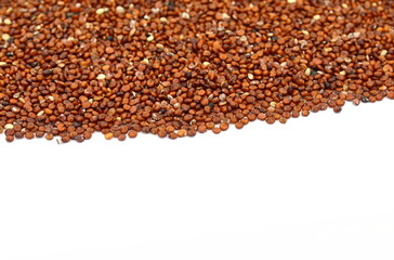 red quinoa seeds isolated on white background. 