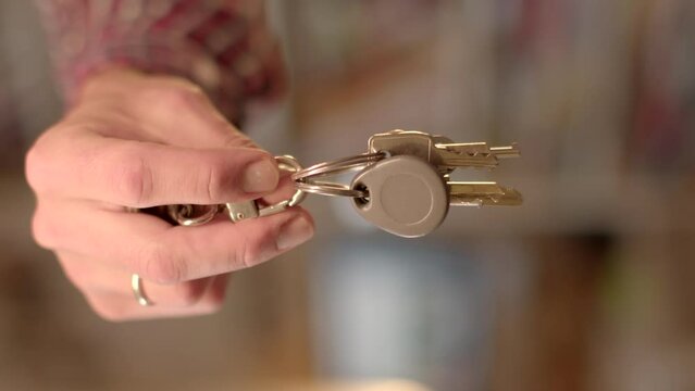 Organizing a Storage System Demonstrating keys on a ring can serve as an example of an effective way to organize and store keys. Open the lock legally.