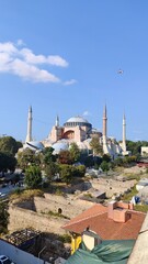 The majestic Hagia Sophia Grand Mosque of Istanbul with birds flying around it