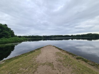 lake panorama view with atmospheric sky in Moritzburg (Saxony/Germany) near the Fasanschlösschen...