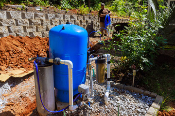 PVC pipe in trench ready to be connected to home well water system