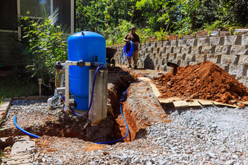 In trench, PVC pipe is ready to connect to home well water system