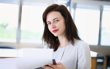 Beautiful smiling businesswoman portrait at workplace look in camera. White collar worker at workspace exchange market job offer certified public accountant internal revenue officer concept