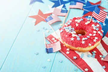 Patriotic sweet donuts 4th july with american flag. Delicious american donuts with red icing and...