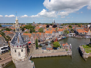 Aerial drone photo of an old tower named Hoofdtoren in the city center of Hoorn, the Netherlands.
