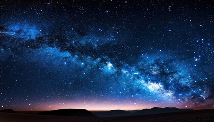 A starry night sky with a milky way in the background