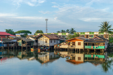 Obraz premium Sunset of Bang Nara River Village and Kolae boat of local fisherman at Narathiwat Province Southern of Thailand.