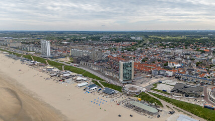 Aerial drone photo of the beach, boulevard and restaurants in the coastal town named Zandvoort in the Netherlands. 