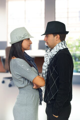 Couple in a Business Room Watching Face to Face