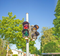 Traffic lights for cyclists and pedestrians, on the streets of a small town