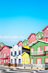 Portugal Aveiro - Wooden houses with colorful stripes in the fishing village of Costa Nova.