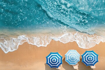 Naklejka premium Aerial view of Beach for summer vacation, swimming, and sunbathing on a sunny day. Top view of Summertime umbrellas