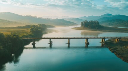 A bridge spanning a vast river, symbolizing connection and overcoming obstacles
