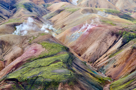 Aerial view of rhyolite mountains and geothermal vents, Landmannalaugar volcanic massif, Fjallabak Nature Reserve, Iceland. September, 2023. 
