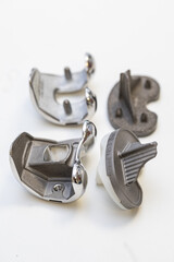 Set of orthopedic knee replacement implants on white background