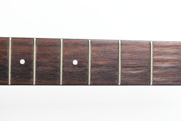 part of brown wood acoustic guitar isolated on white background