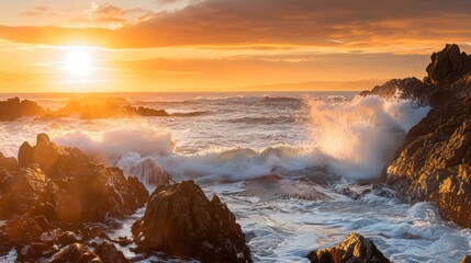 Obraz premium Beautiful sunset over the ocean, waves crashing against the beach and rocks