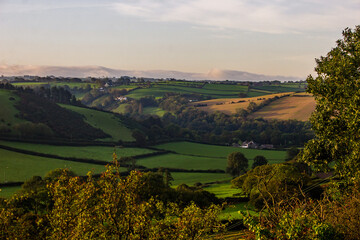 Early Dawn view over the patchwork rolling Welsh countryside just outside the town of Aberystwyth