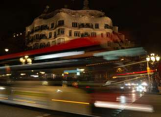 Bus lights passing through a street