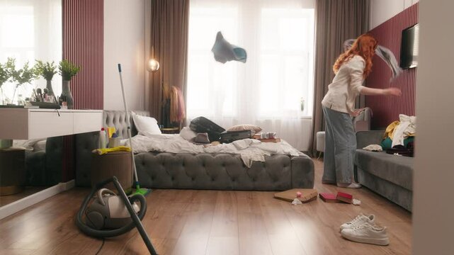 Caucasian woman traveler rush hurry pack luggage travel late prepare for holidays package clothes in bedroom mess female housekeeper busy Caucasian girl housewife cleaning home mop floor tidy cleanup