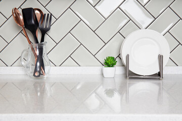 Kitchen countertop with utensils and dishes holder