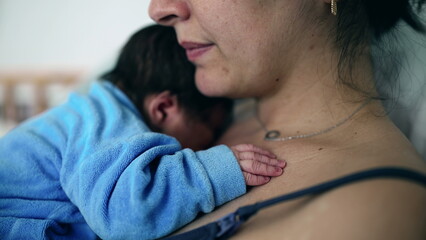 Close-up of a newborn baby resting on mother's chest, highlighting tender moments of early bonding, healthcare setting, postnatal care, emotional connection, new family, nurturing love