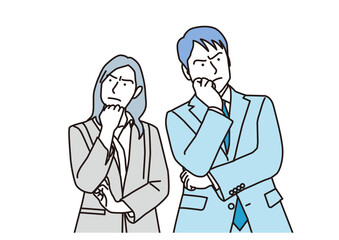 腕組みをして悩む男女のビジネスマン